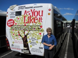 Director Judy Rankin with the bus advertising.
